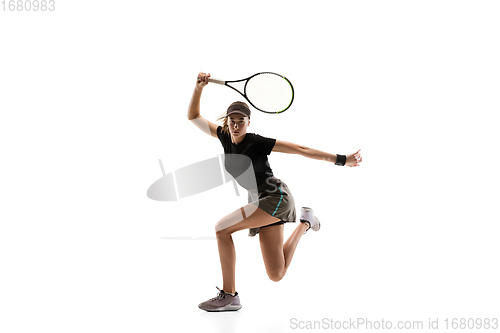 Image of Young caucasian professional sportswoman playing tennis isolated on white background