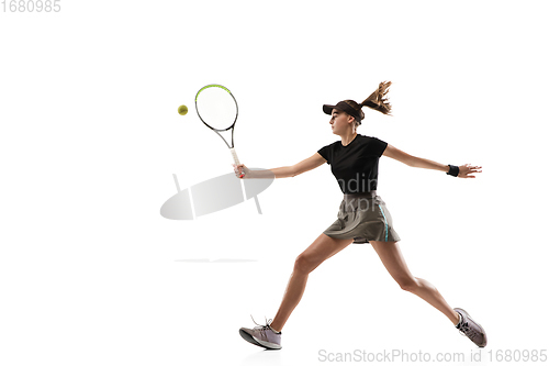 Image of Young caucasian professional sportswoman playing tennis isolated on white background