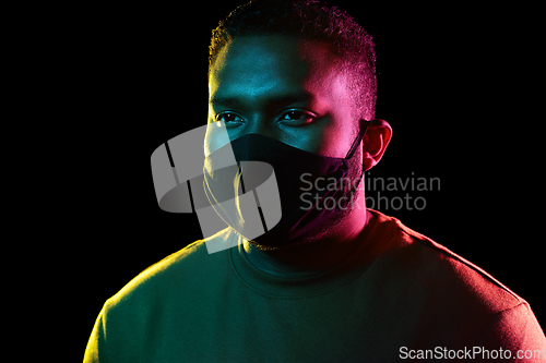 Image of african american man wearing black reusable mask