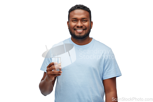 Image of happy african american man with glass of water