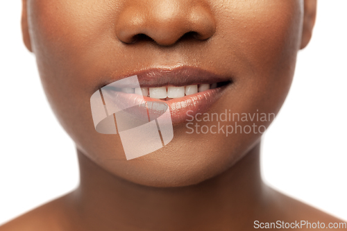 Image of close up of face of smiling african american woman