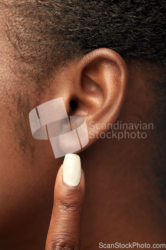 Image of close up of african american woman's ear