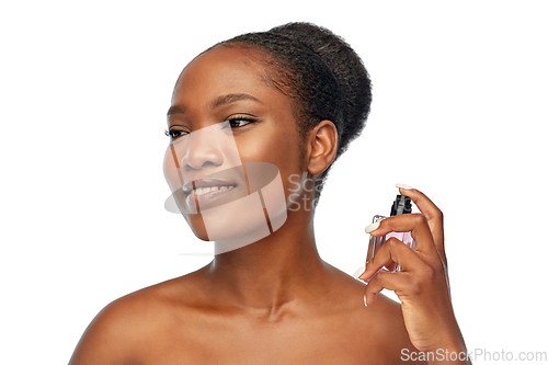 Image of young african american woman with perfume