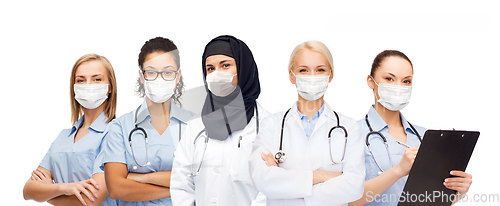 Image of group of female doctors in masks with stethoscopes