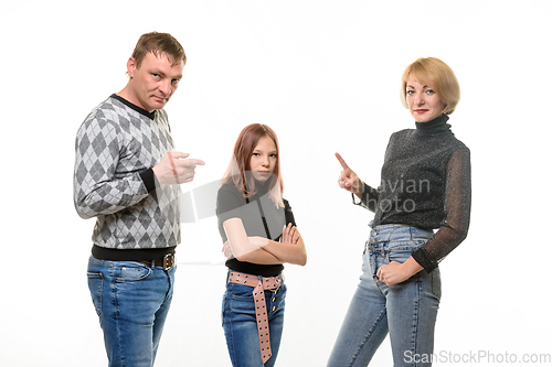 Image of Mom and dad scold daughter