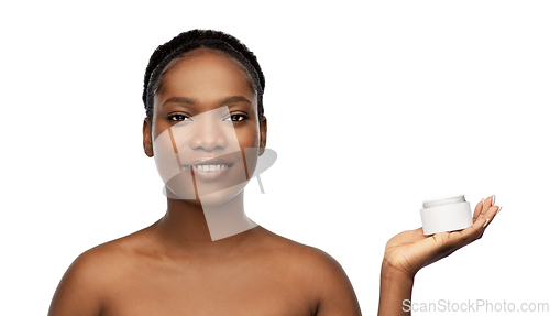 Image of smiling african american woman with moisturizer