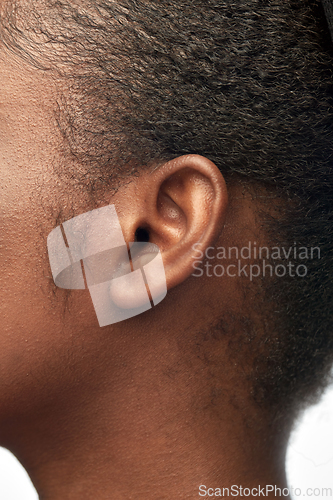 Image of close up of african american woman's ear