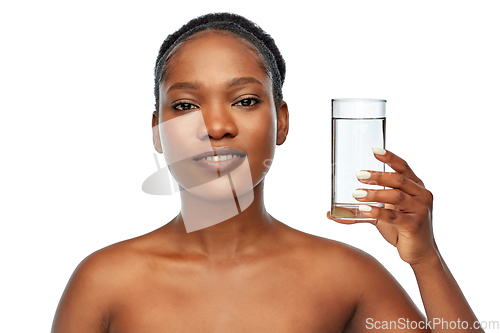 Image of young african american woman with glass of water