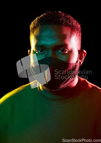 Image of african american man wearing black reusable mask