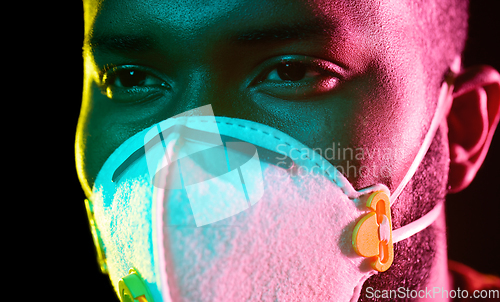 Image of african american man in mask or respirator