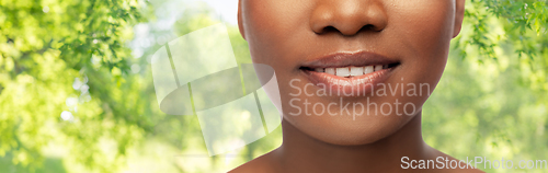 Image of close up of face of smiling african american woman