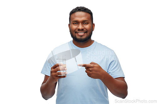 Image of happy african american man with glass of water