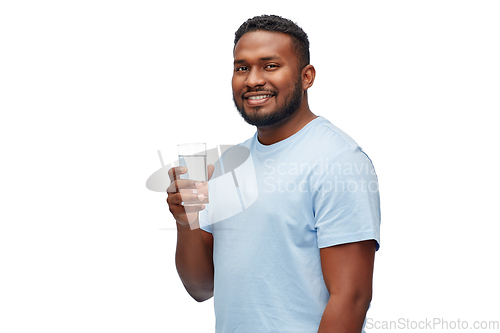 Image of happy african american man with glass of water