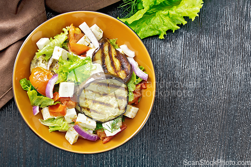 Image of Salad of eggplant with feta and tomatoes on board top