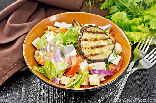 Image of Salad of eggplant with feta and tomatoes on board