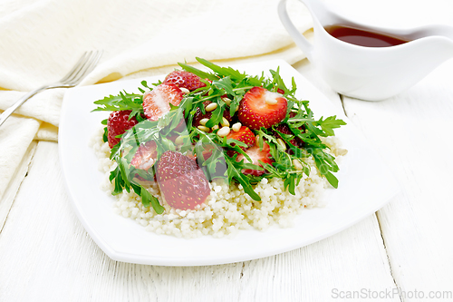 Image of Salad of strawberry and couscous on white board