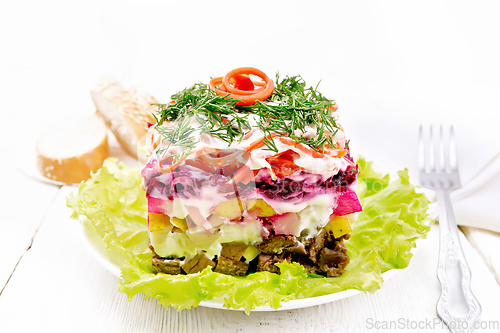 Image of Salad with beef and vegetables on light board