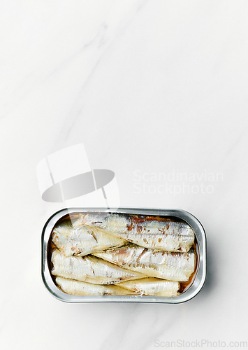 Image of open sardines can