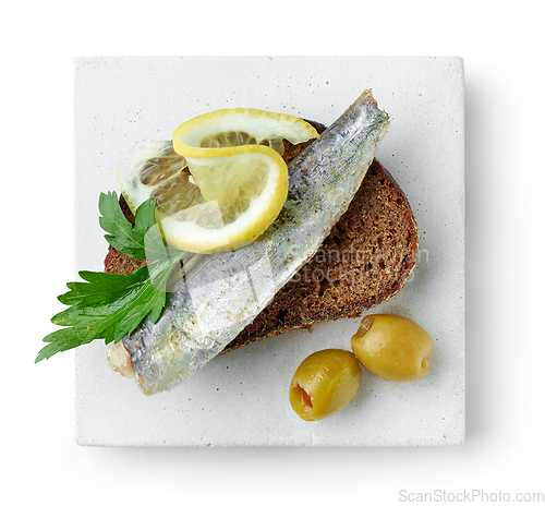 Image of plate of sandwich with canned sardine