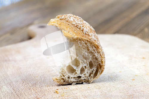 Image of piece of fresh baguette