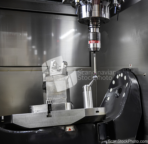 Image of Metalworking CNC milling machine. Cutting metal modern processin