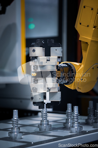 Image of Robotic Arm modern industrial technology. Automated production c