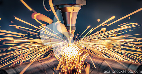 Image of CNC Laser cutting of metal, modern industrial technology.