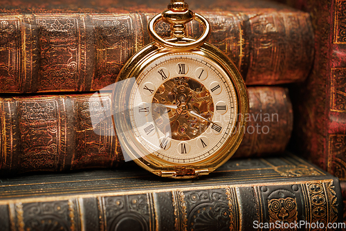 Image of Old Books and Vintage pocket watch