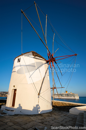 Image of Traditional greek windmills on Mykonos island at sunrise, Cyclades, Greece