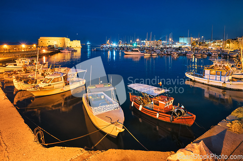 Image of Venetian Fort in Heraklion and moored fishing boats, Crete Island, Greece