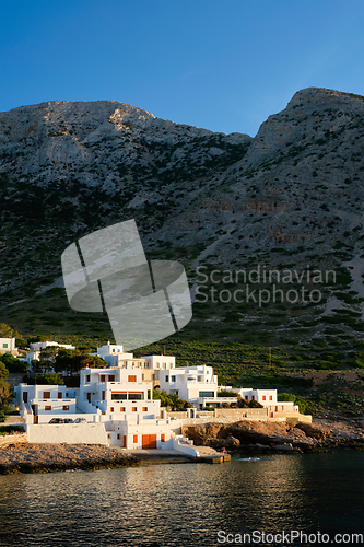 Image of Kamares town with traditional white houses on Sifnos island on sunset. Greece