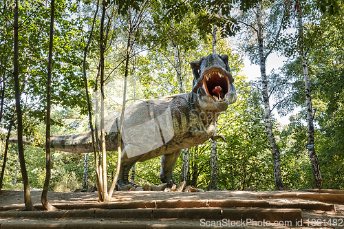 Image of prehistoric dinosaurs Tyrannosaurus Rex in wildlife