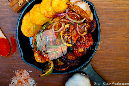 Image of roasted grilled BBQ chicken breast with herbs and spices