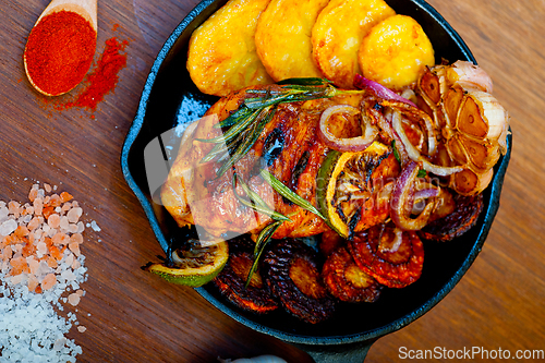 Image of roasted grilled BBQ chicken breast with herbs and spices