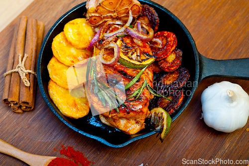 Image of roasted grilled BBQ chicken breast with herbs and spices