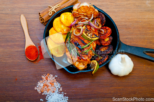 Image of roasted grilled BBQ chicken breast with herbs and spices