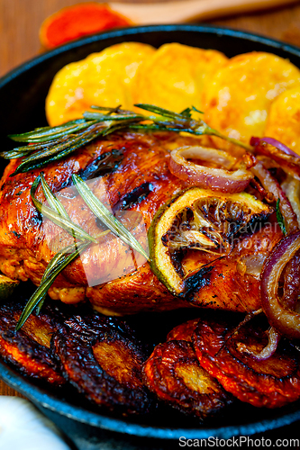 Image of roasted grilled BBQ chicken breast with herbs and spices