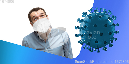 Image of Man in protective face mask on white and blue fluid studio background. New rules of COVID spreading prevention