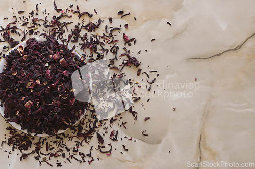 Image of Dry hibiscus tea in a bowl