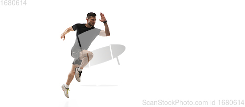 Image of Caucasian professional sportsman training isolated on white studio background. Muscular, sportive man practicing.