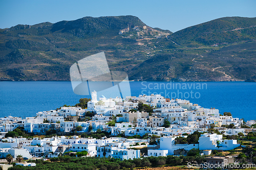 Image of View of Plaka village with traditional Greek church. Milos island, Greece