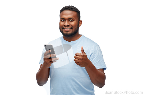 Image of happy african american man with smartphone