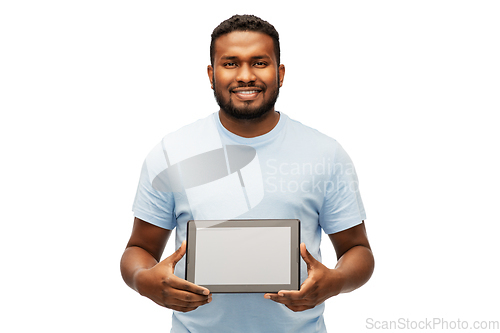 Image of happy african american man with tablet computer