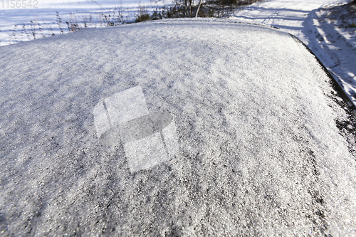 Image of car covered with snow