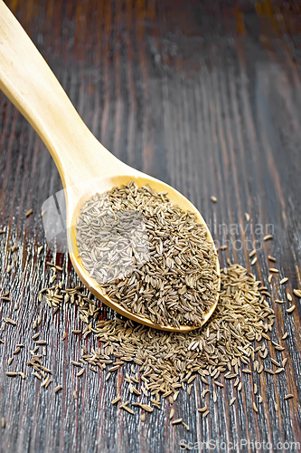 Image of Cumin seeds in spoon on table