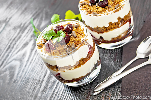 Image of Dessert Black Forest in two glasses on dark board