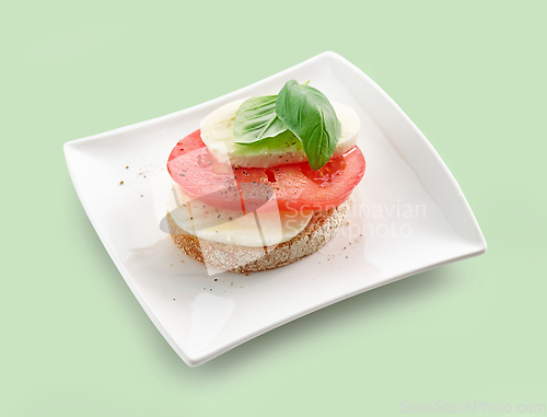 Image of bruschetta with tomato and mozzarella