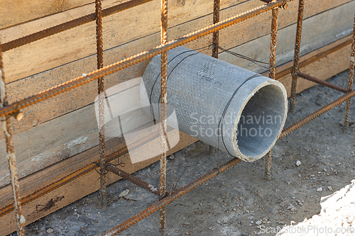 Image of Sleeve for the withdrawal of communications from an asbestos pipe during the construction of a strip foundation