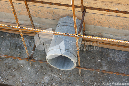 Image of Construction of a strip foundation, laying a sleeve for communications