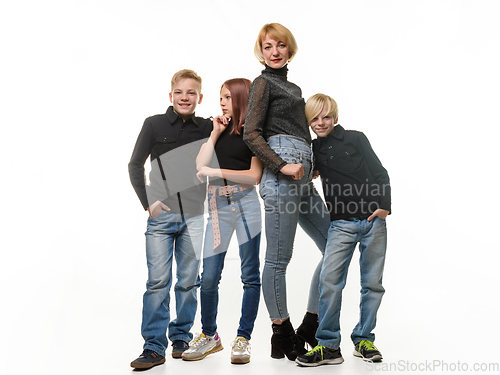 Image of Mom with three teenagers, two boys and a girl, isolated on a white background